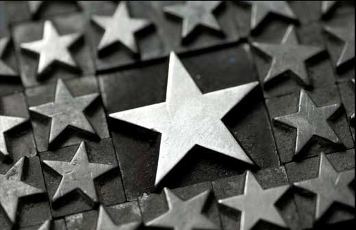 Stamped metal stars created by Aero Vac Alloy Forge.